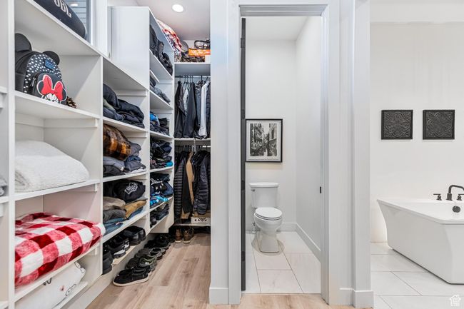 View of walk in closet | Image 26