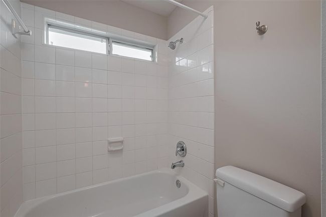Convenient separate door from the vanity area and the shower tub combo. | Image 29