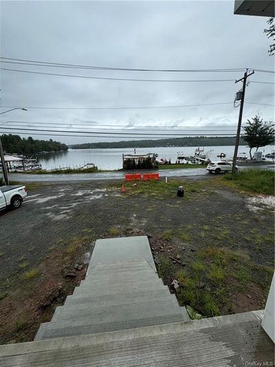 View of yard featuring a water view | Image 2