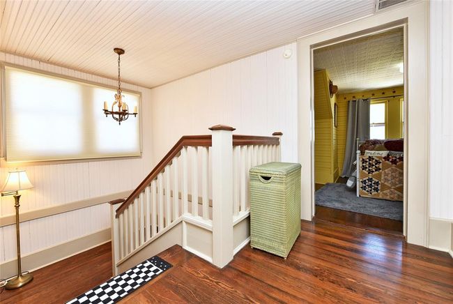 This is the top of stairs in the Main house. There are 2 bedrooms and a large bath and massive storage closet upstairs. | Image 17