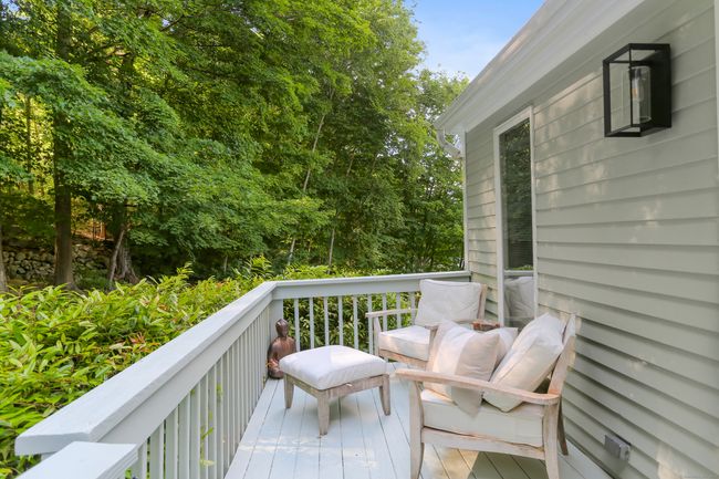 The deck is privately located away from the other units, and is large enough for a sitting area or dining area. | Image 21