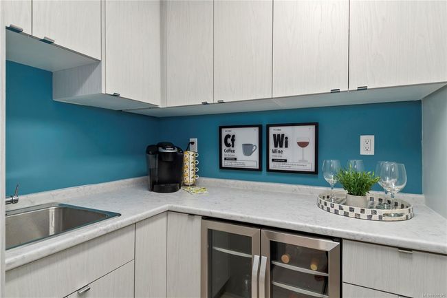 Butler's pantry with wine fridge. | Image 12