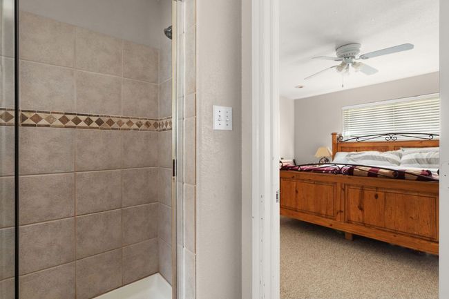 Stand-alone tiled shower in the master suite | Image 14