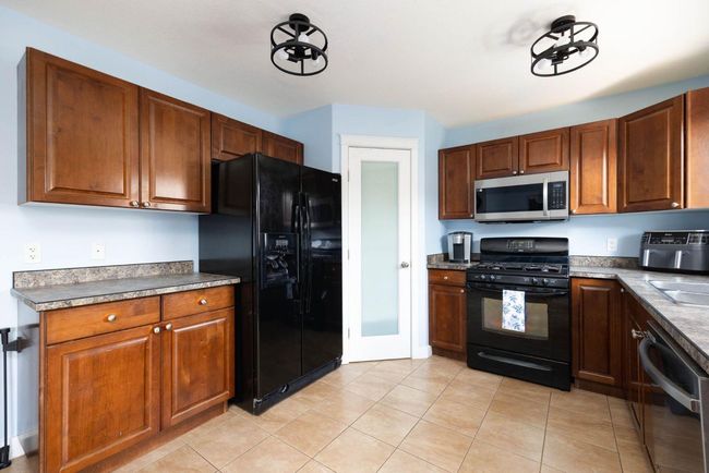 129 Honeysuckle Way, House other with 5 bedrooms, 4 bathrooms and 2 parking in Fort Mcmurray AB | Image 5