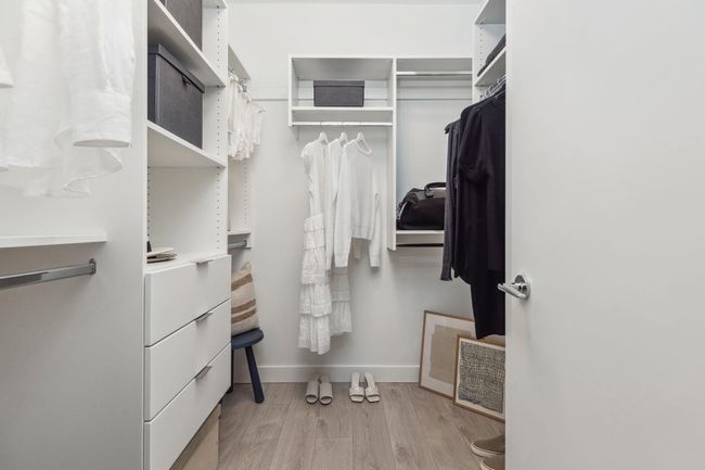 Spacious closet with wood finished floors and visible vents | Image 10