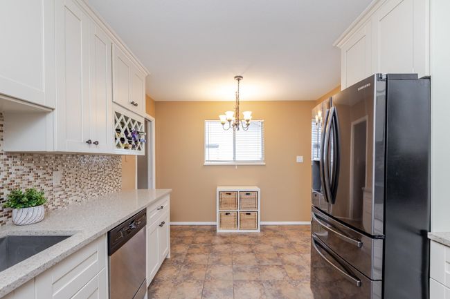 1350 Sutherland Ave, House other with 5 bedrooms, 3 bathrooms and 4 parking in Port Coquitlam BC | Image 13