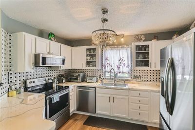 14511 Lockslie Trail - MLS Sized - 004 - 07 Kitchen.jpg | Image 1