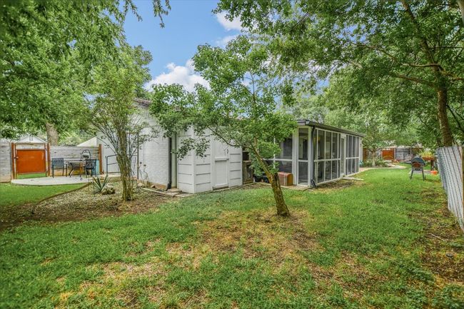 View of yard with a sunroom | Image 20