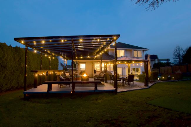 Back of property featuring a yard, fence, a pergola, and a wooden deck | Image 29