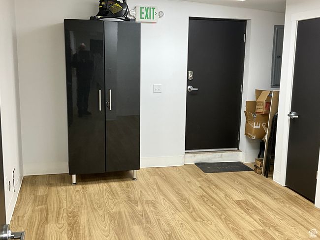 Foyer with electric panel, baseboards, and wood finished floors | Image 27