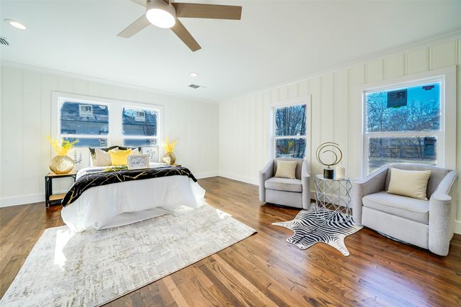 Bedroom featuring crown molding, ceiling fan, and dark hardwood / wood-style flooring | Image 17