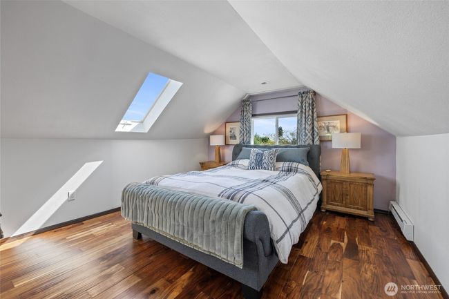 primary bedroom upstairs with peek-a-boo view | Image 17
