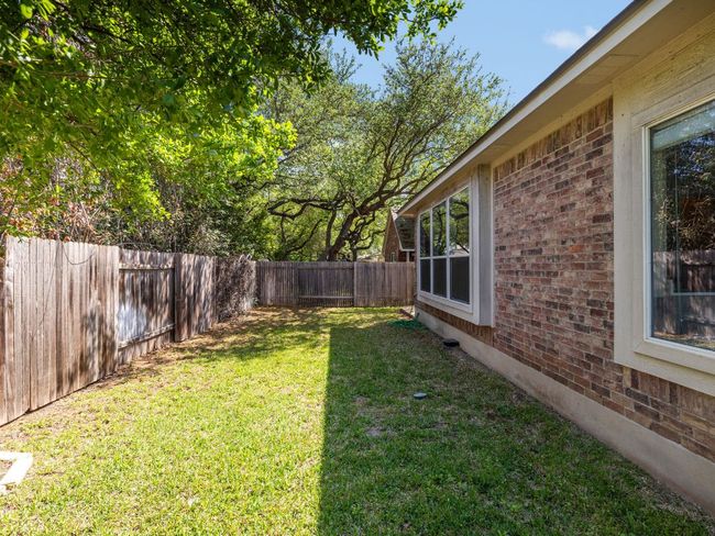 Backyard is large enough for kids / pets to play in, without being an obligation. | Image 19