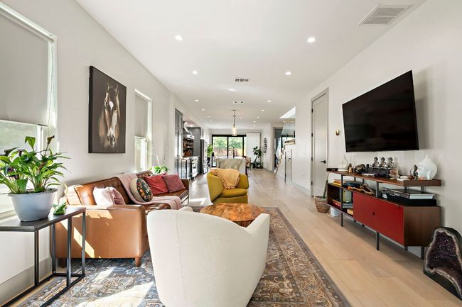 Living area featuring recessed lighting, visible vents, and light wood-style flooring | Image 4
