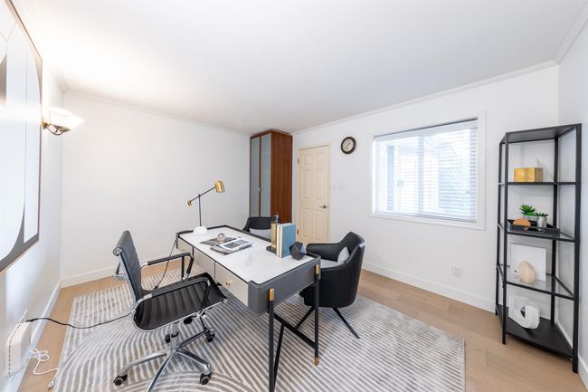 Office area with baseboards, crown molding, and light wood-style flooring | Image 6