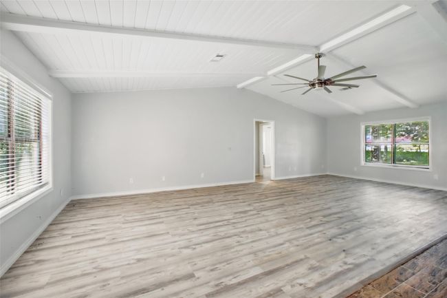 A space that invites you to unwind, with architectural interest and a layout that opens beautifully into the rest of the home. | Image 16