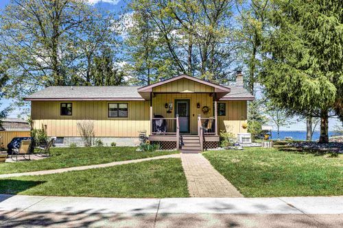 115 Logan Ave, Houghton Lake, MI, 48629-9018 | Card Image