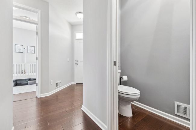 There's a powder bath just off the foyer/near the laundry area! | Image 15