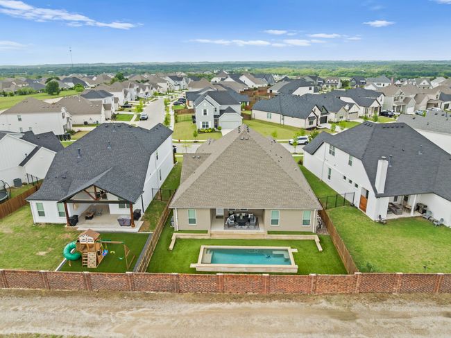 4 bed, 3 car tandem, single story, pool, tall ceilings, beautiful flooring, open concept, fireplace, beamed ceiling. So many updates. | Image 39