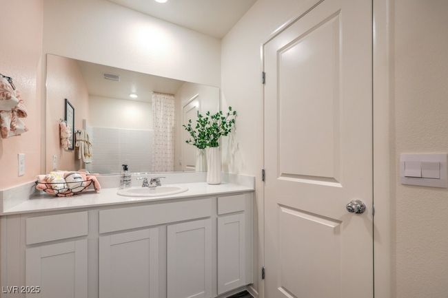 Full bathroom with a shower, visible vents, and vanity | Image 31
