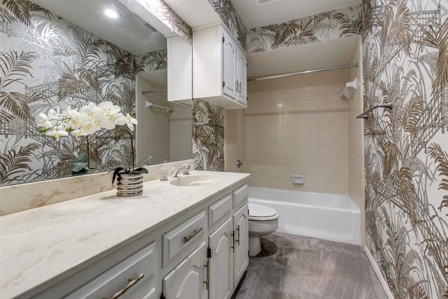 Full bath featuring vanity, and bathtub / shower combination | Image 24