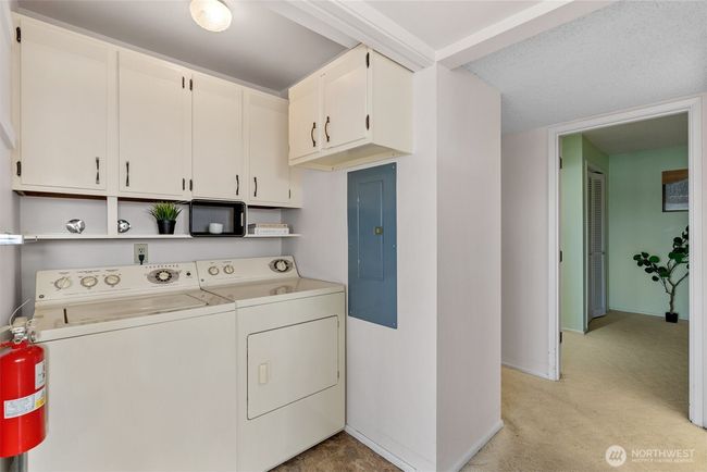 Full size washer and dryer in the unit! And with even more storage. | Image 17