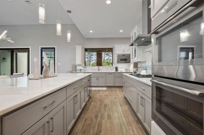Kent Moore's custom-made cabinets provide the perfect finishing touch to this beautifully designed kitchen. | Image 16