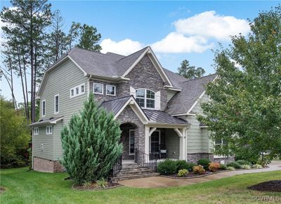 Craftsman house with a porch and a front yard | Image 2