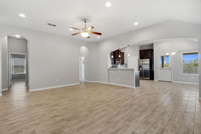 Light, wood-like tile flooring throughout (no carpet) | Image 5