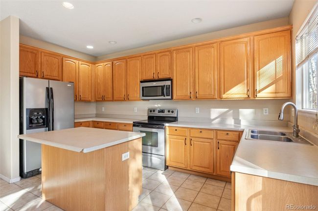 11406 E 119 Th Pl, House other with 3 bedrooms, 3 bathrooms and 3 parking in Henderson CO | Image 12