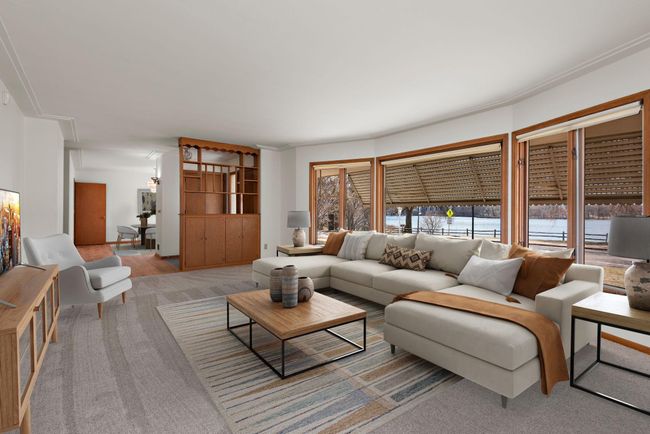 Huge Main Floor Living Room with bay window, Lake and Sunset views! | Image 14