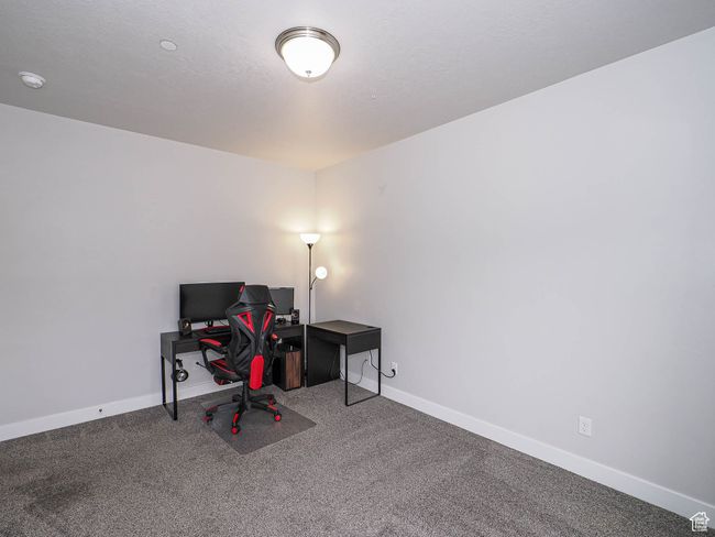 Home office featuring carpet floors and baseboards | Image 27