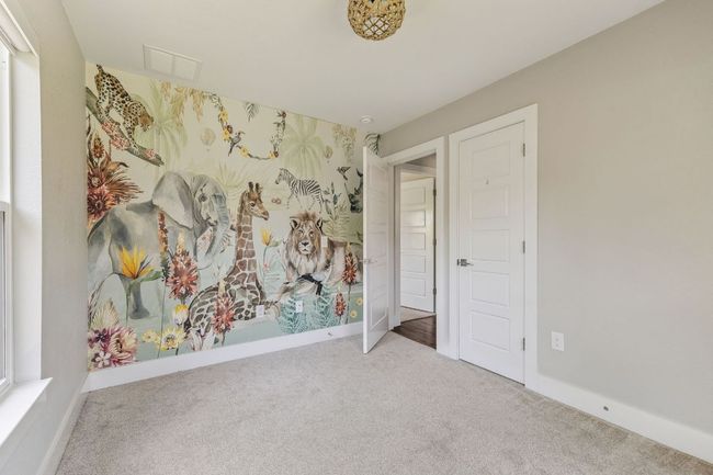 Empty room featuring carpet flooring and baseboards | Image 28