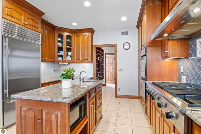 4173 Dornoch Ct, House other with 6 bedrooms, 4 bathrooms and null parking in Williamsburg MI | Image 16