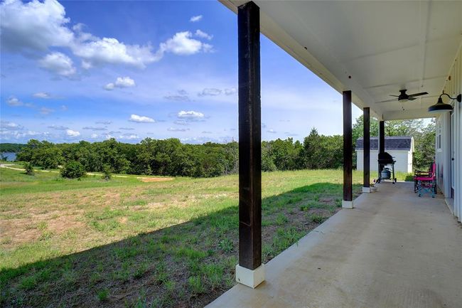 View of yard with ceiling fan | Image 32