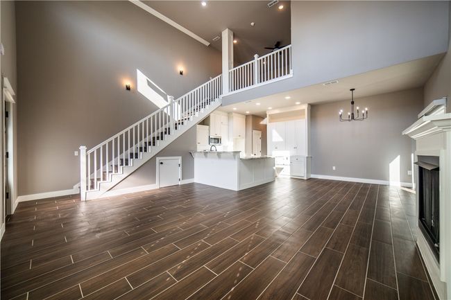 Living area looking toward kitchen and dining area | Image 8