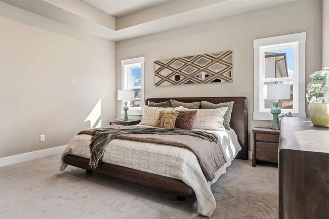 Bedroom with light colored carpet and baseboards | Image 49