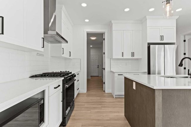 271 Kinniburgh Loop, House other with 4 bedrooms, 3 bathrooms and 4 parking in Chestermere AB | Image 16