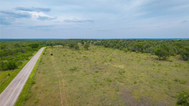 Bird's eye view of a heavily wooded area | Image 5