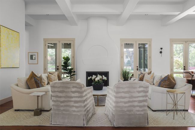 Living area featuring french doors and gas fireplace | Image 13