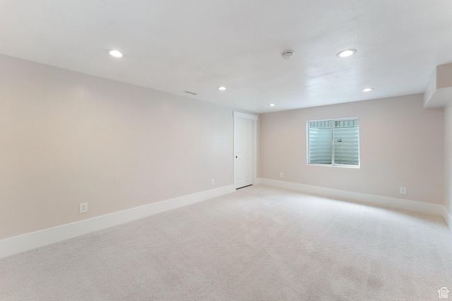 Bedroom 7 with recessed lighting and light colored carpet | Image 34