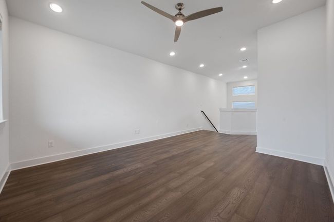 Unfurnished room featuring recessed lighting, dark wood finished floors, and a ceiling fan | Image 9