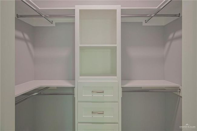 View of spacious closet | Image 15