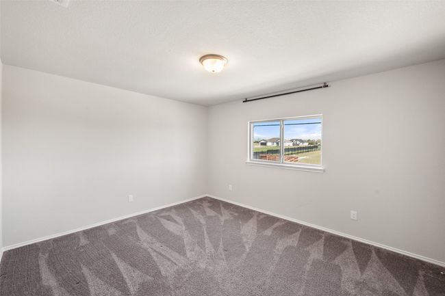 Empty room with carpet flooring and baseboards | Image 11