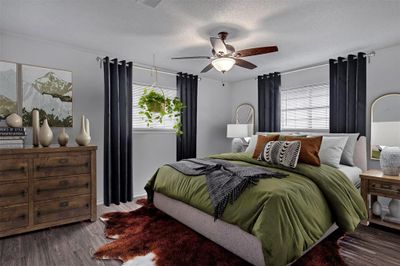 Bedroom with a textured ceiling, ceiling fan, and dark hardwood / wood-style flooring *Virtually staged* | Image 2