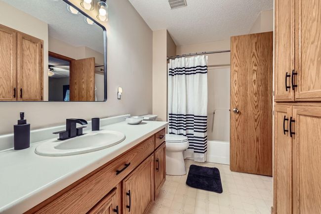 Upstairs enjoy 2 bedrooms with a walk-thru full bath connecting to the primary! | Image 14