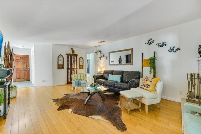 The easy flow into the kitchen and sunroom makes this space perfect for everyday living and entertaining alike | Image 4