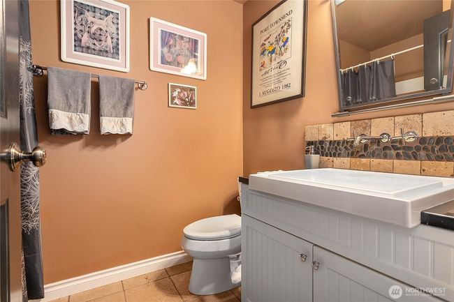 3/4 guest bathroom outside in that same hallway. | Image 33