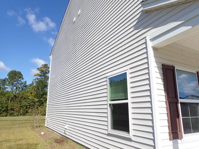 View of side of property with a lawn | Image 3