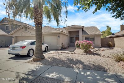 7911 W Hilton Avenue, House other with 4 bedrooms, 2 bathrooms and null parking in Phoenix AZ | Image 1